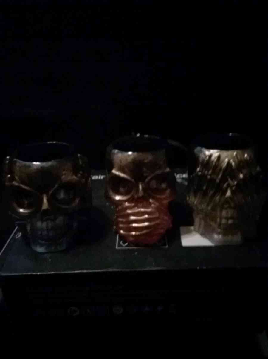 4 different sets of hear see or speak evil candle holders