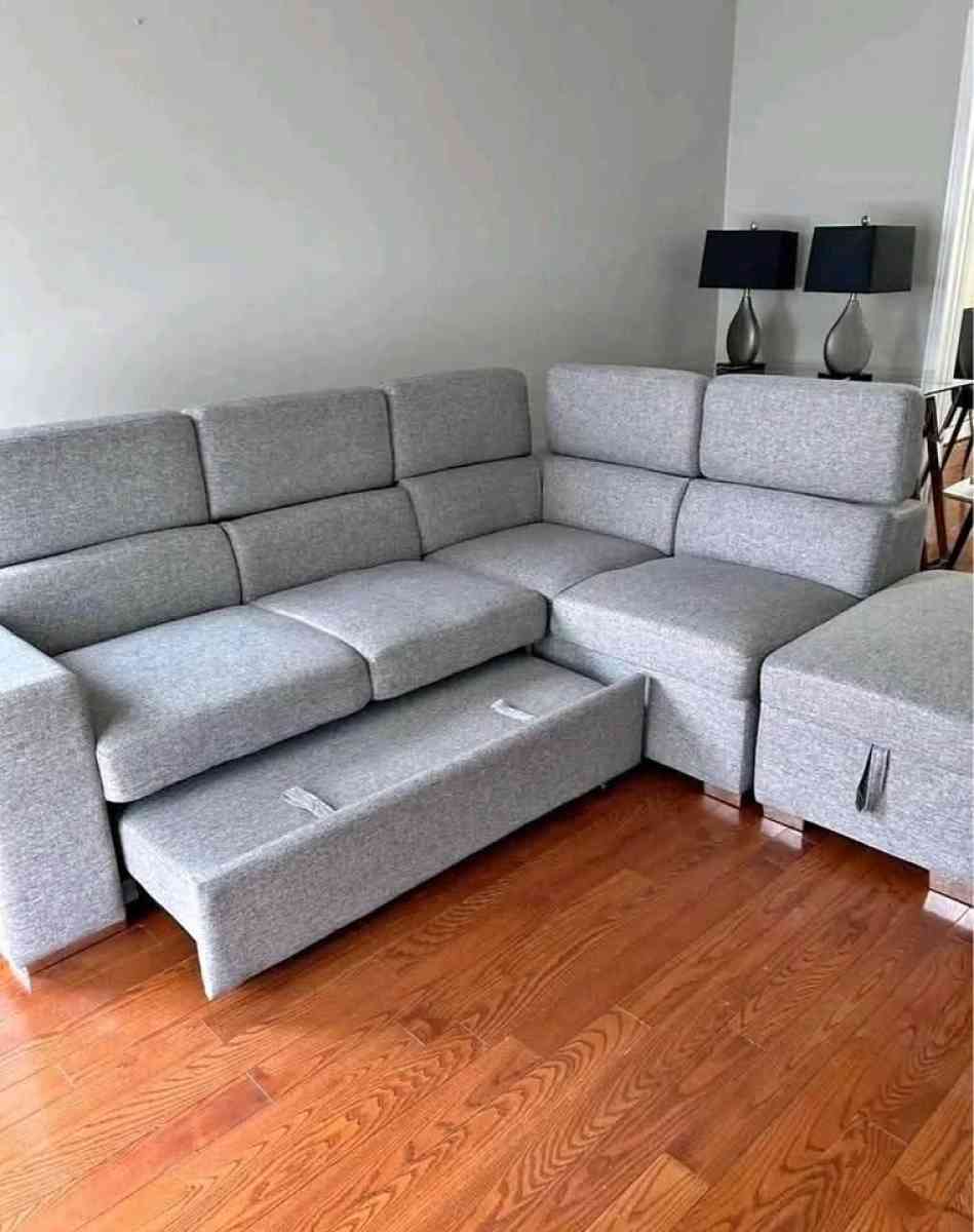 Grey Sectional sofa with pull out bed