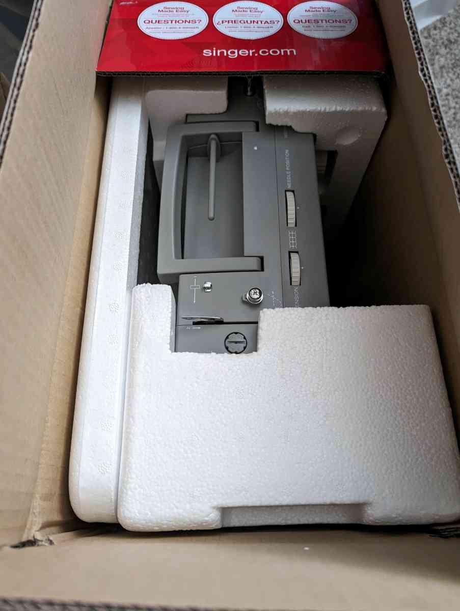 heavy duty Singer sewing machine with table extension