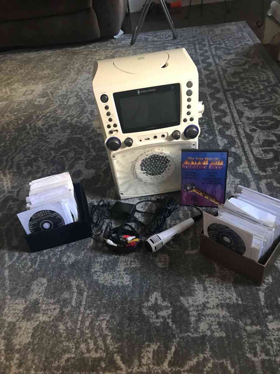Karaoke CDs all genre worth 1000 free Karaoke machine