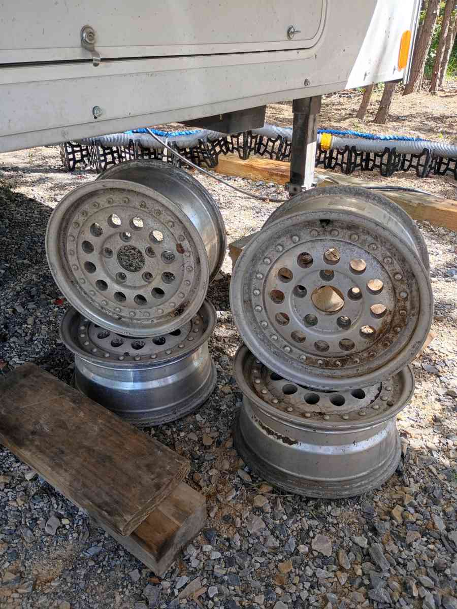 4 5 lug aluminum rims bullet hole