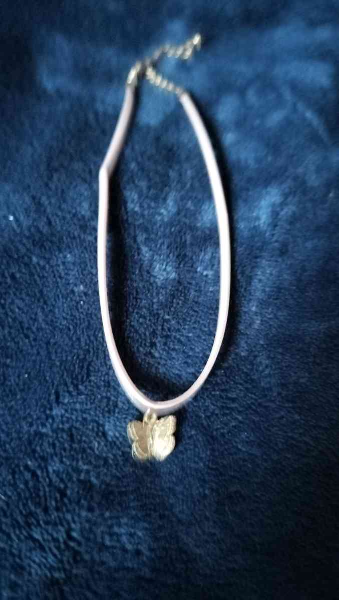 Two choker necklaces and a silver bracelet