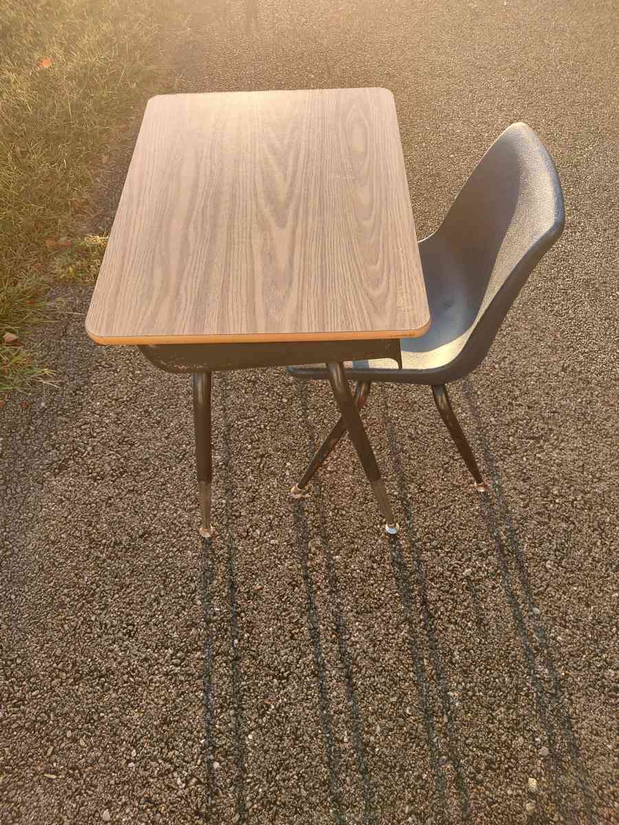 metal desk with a chair or a end table