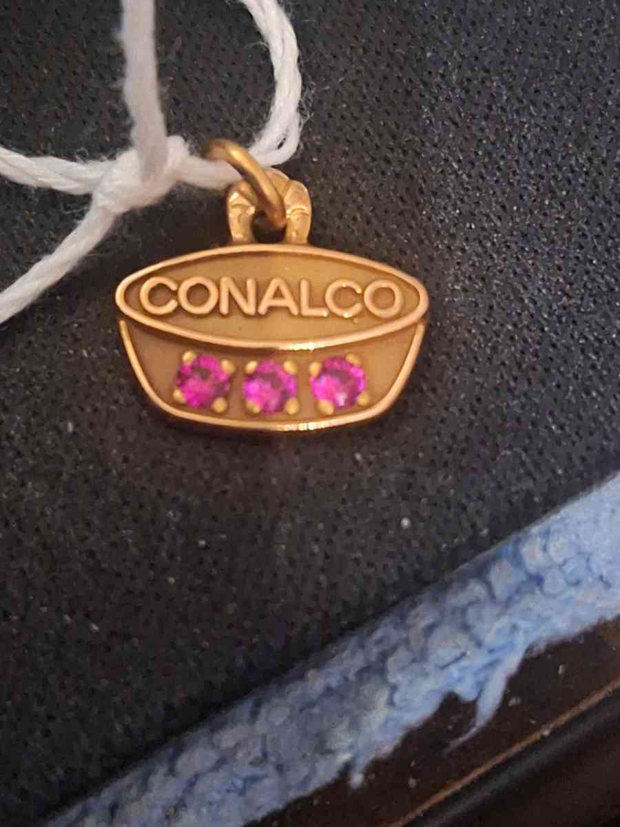 10K pendant  1 point 4 grams