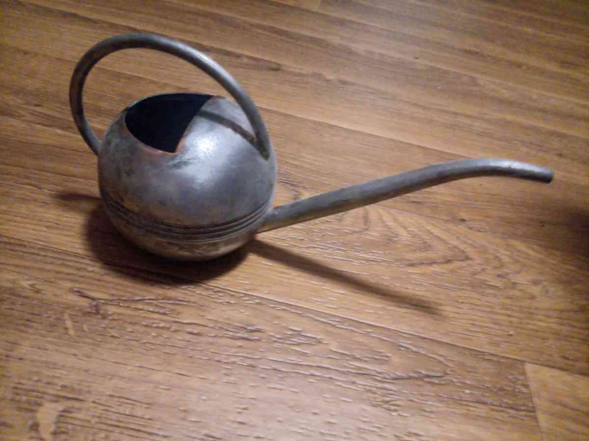 copper watering can