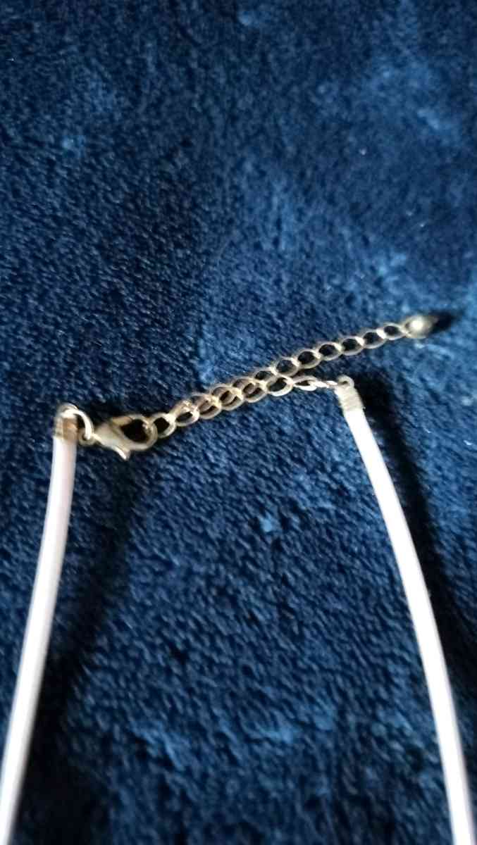 Two choker necklaces and a silver bracelet