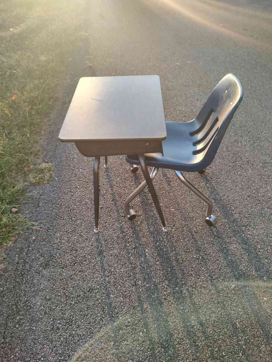 metal desk with a rolling chair or a end table