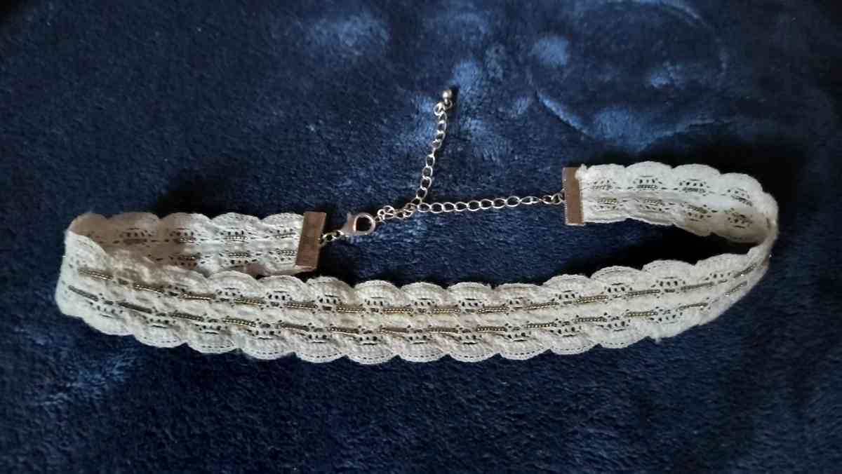 Two choker necklaces and a silver bracelet