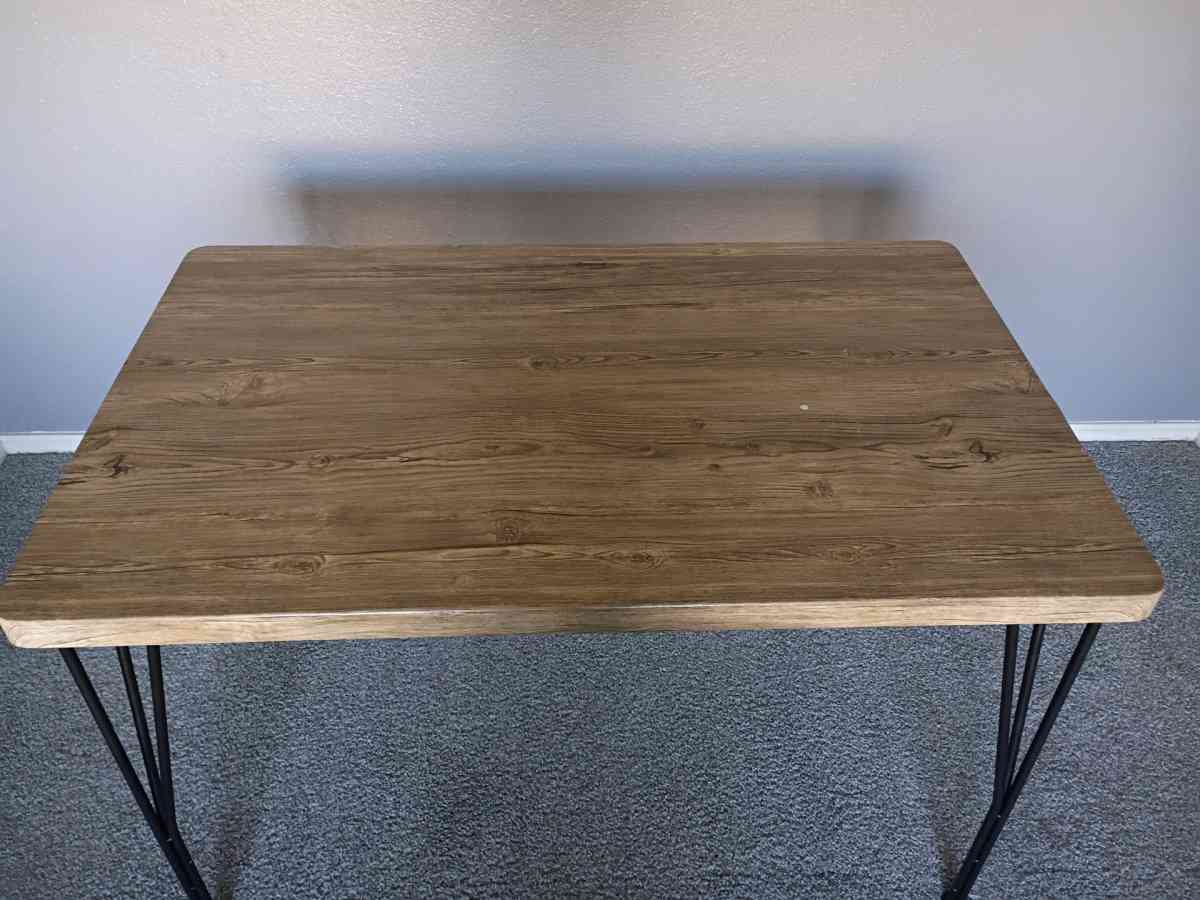 is a beautiful brown table  and I am selling it for 48