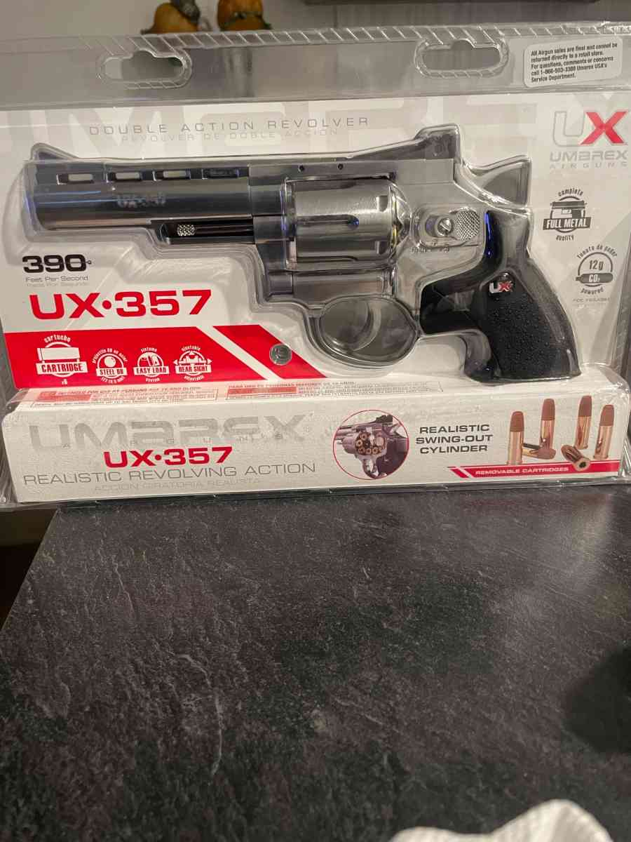 UX357 Brand new never opened realistic