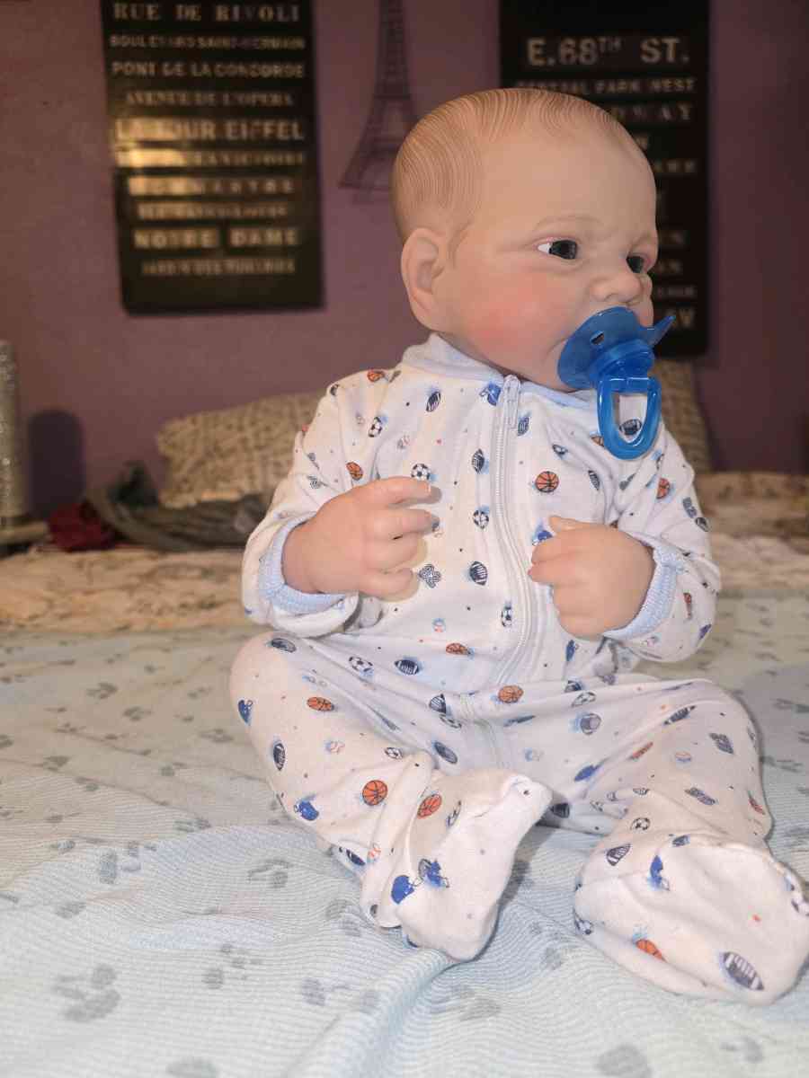 Realistic looking baby boy doll