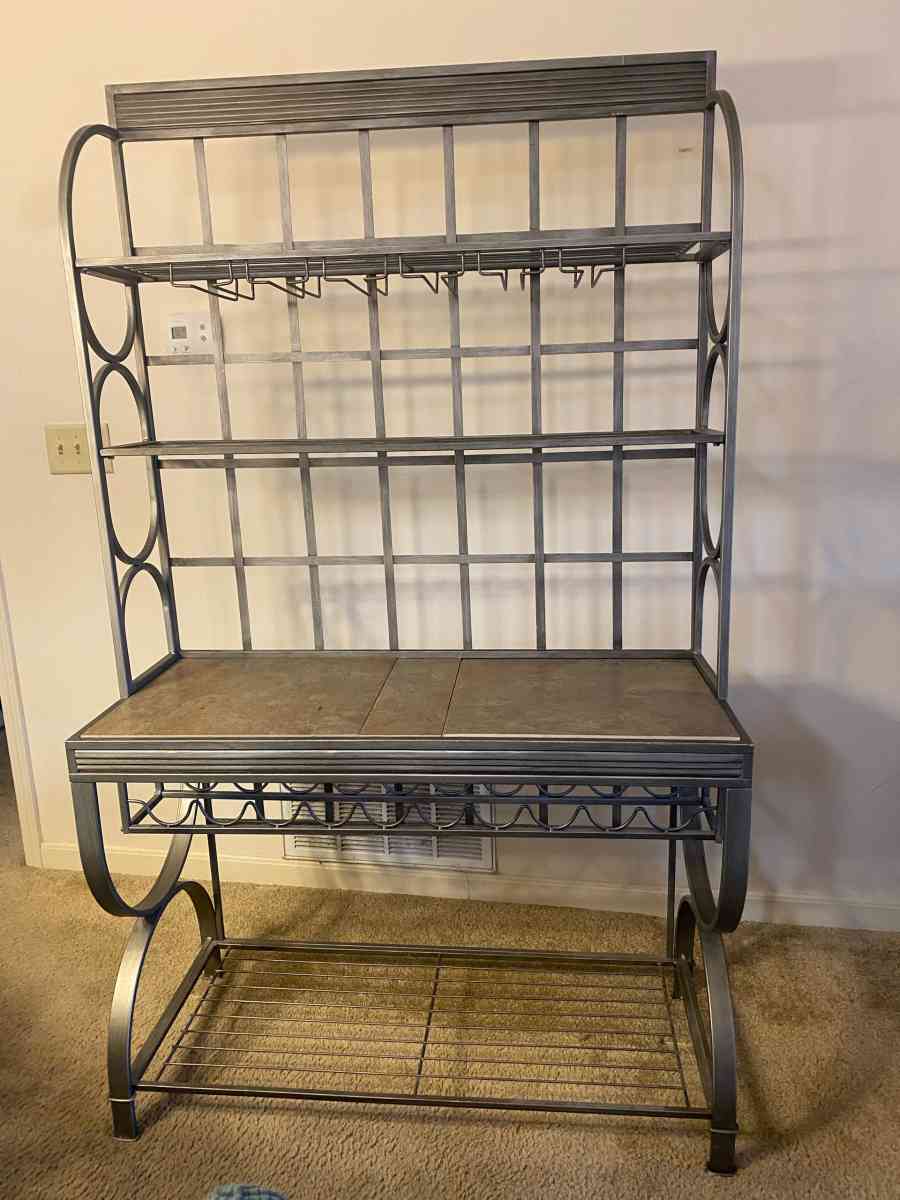 gray metal bakers and wine rack