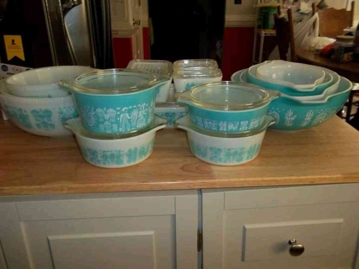 two sets of turquoise Pyrex vintage dishes