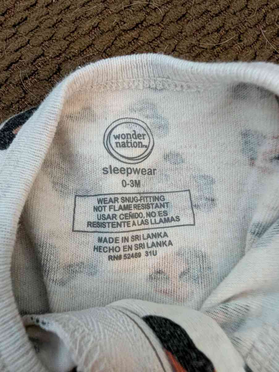 Leopard print baby sleepsuit with feet