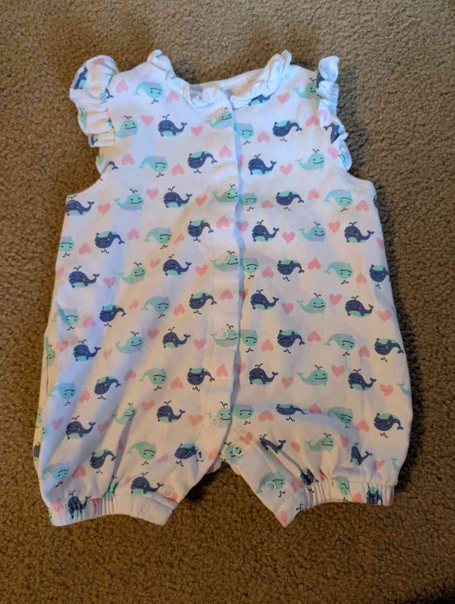 Baby romper with a whale pattern