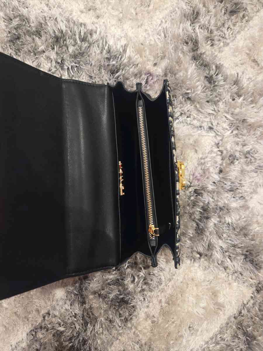 Luxury Monogram Handbag with Gold Accents and Pearl Lock Det