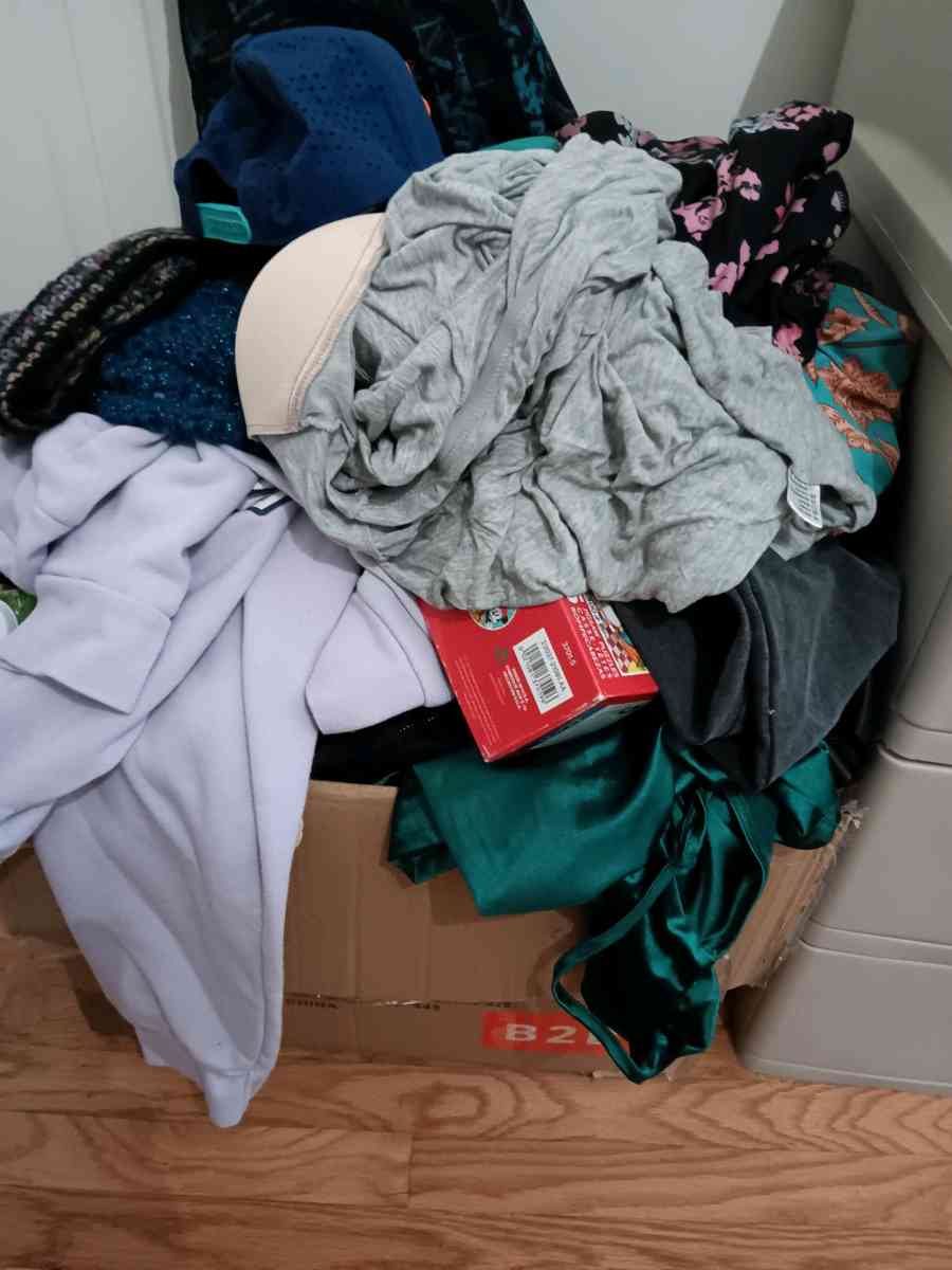 box of resellable yard sale left overs