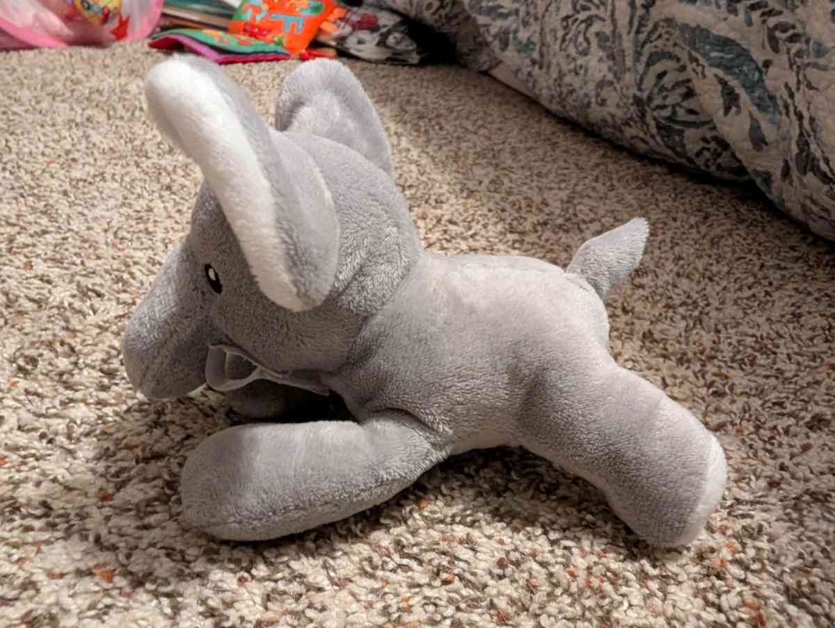 Plush elephant pacifier holder