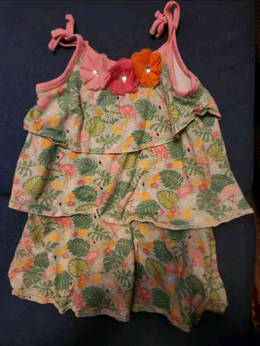Girl dress with flamingos