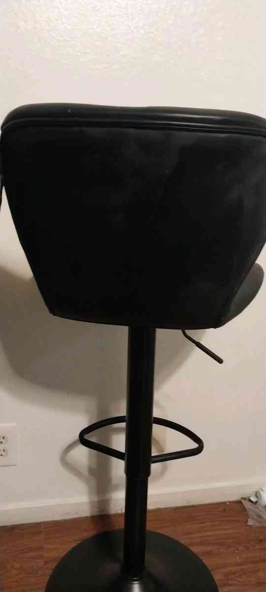 2 black barstools adjustable height