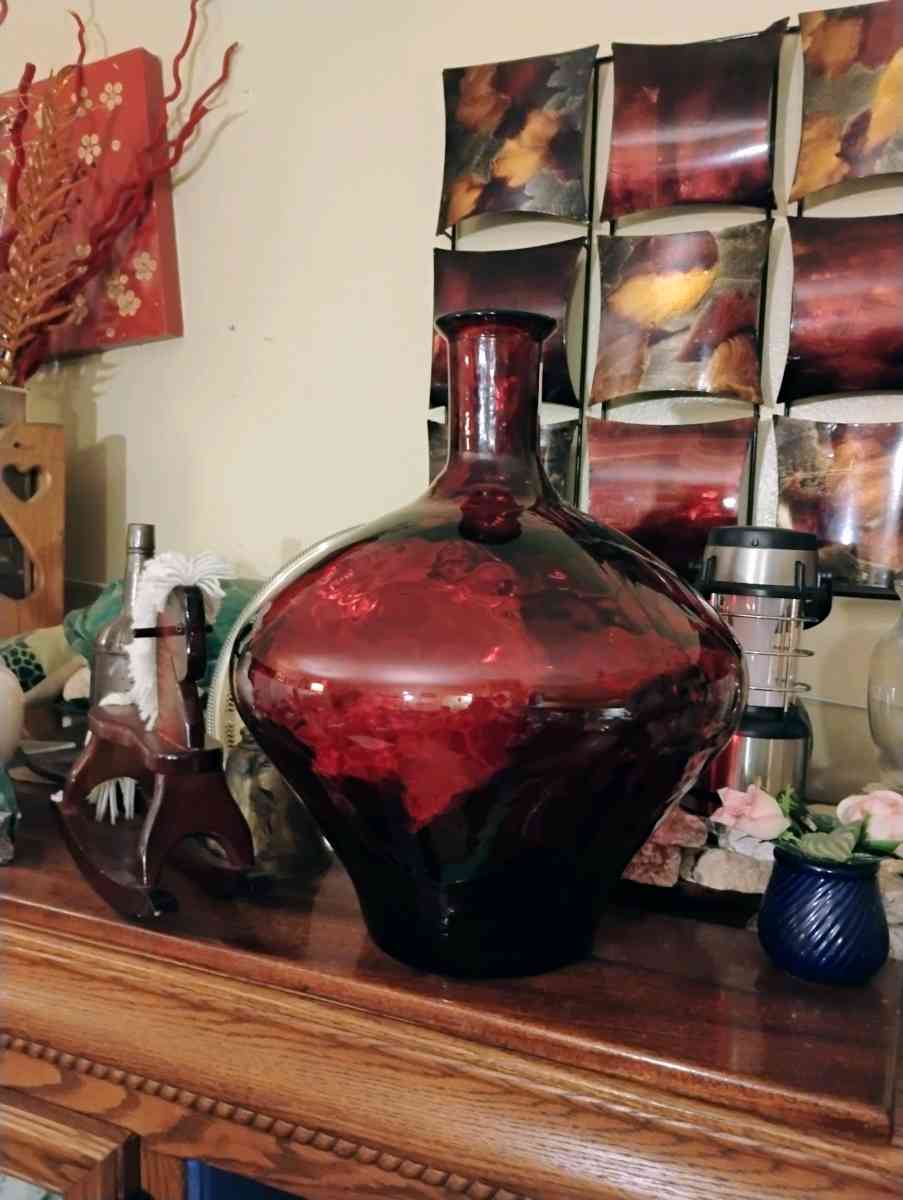 large red quality  glass bottle very heavy