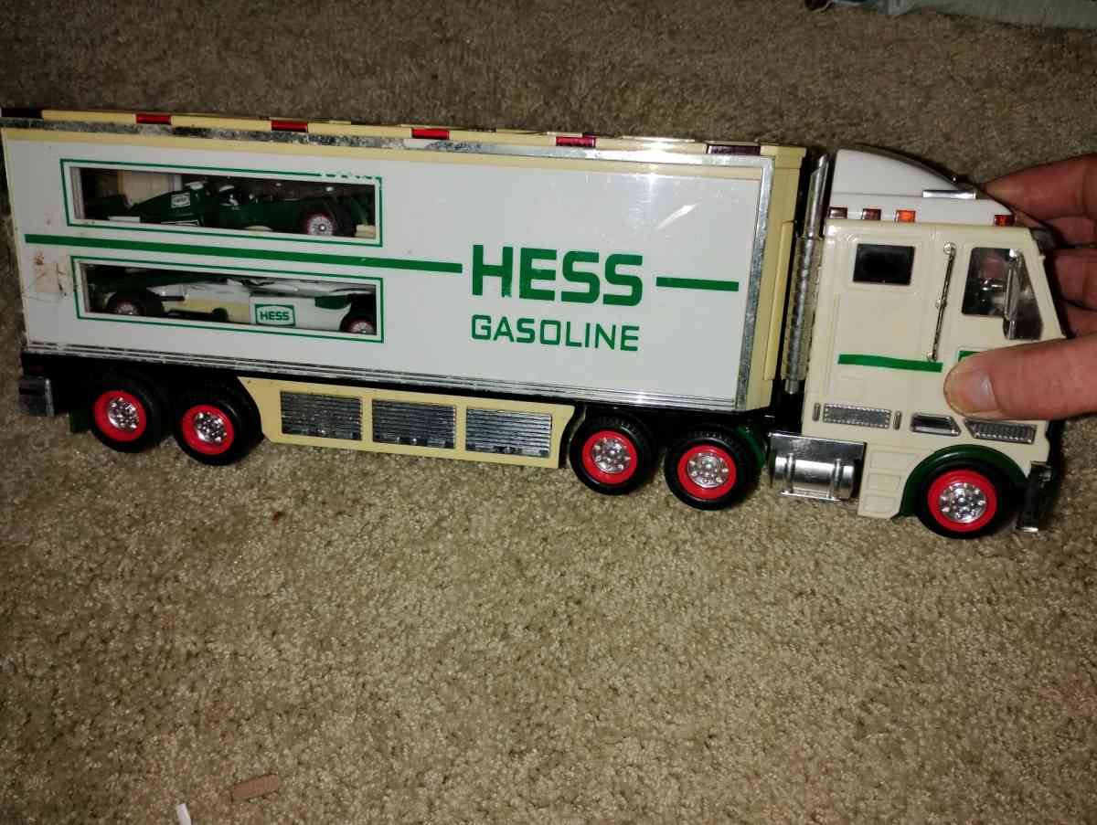 2003 Hess Toy Truck and Racecars This collectible toy inclu