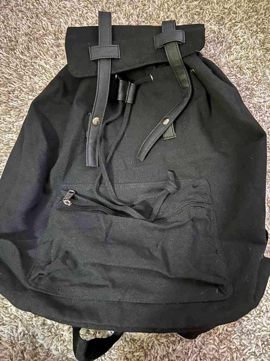 Trendy Black Canvas Backpack with Luxurious Leather Accents