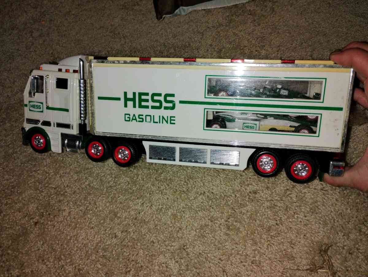 2003 Hess Toy Truck and Racecars This collectible toy inclu