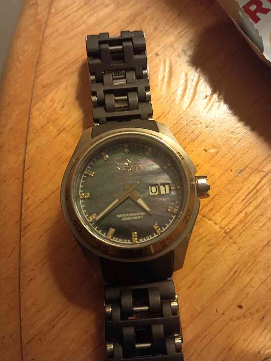 invicta mother of pearl dial watch