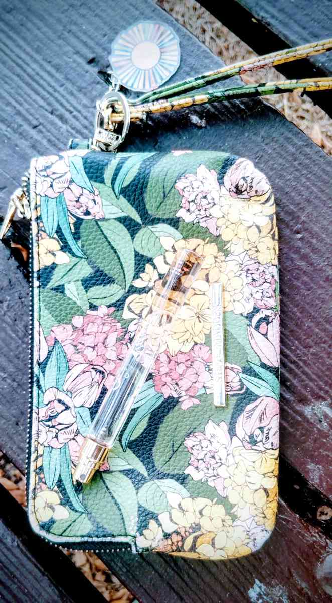 Steve Madden Cosmetic Purse With Free Bottle Of Gucci Perfum