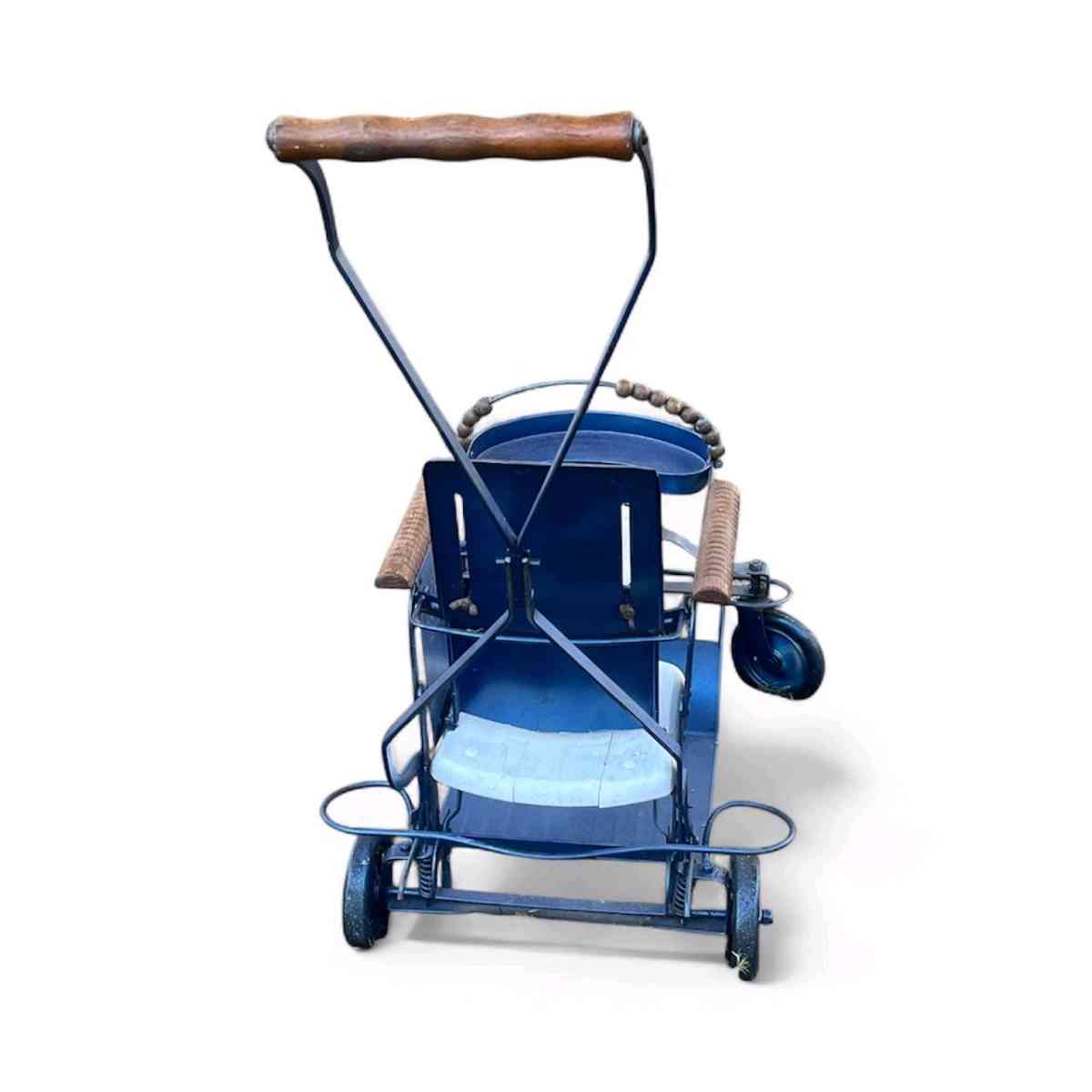 Antique baby scroller