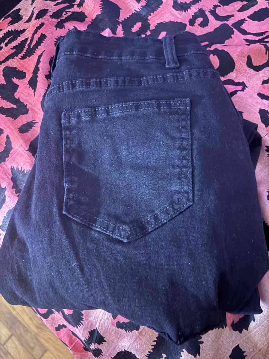brand new black cut jeans
