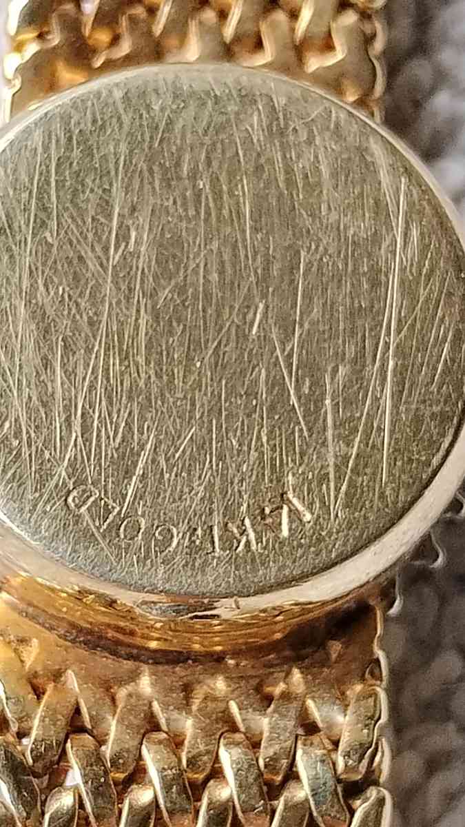 14 karat gold diamond Geneva quartz watch for ladies