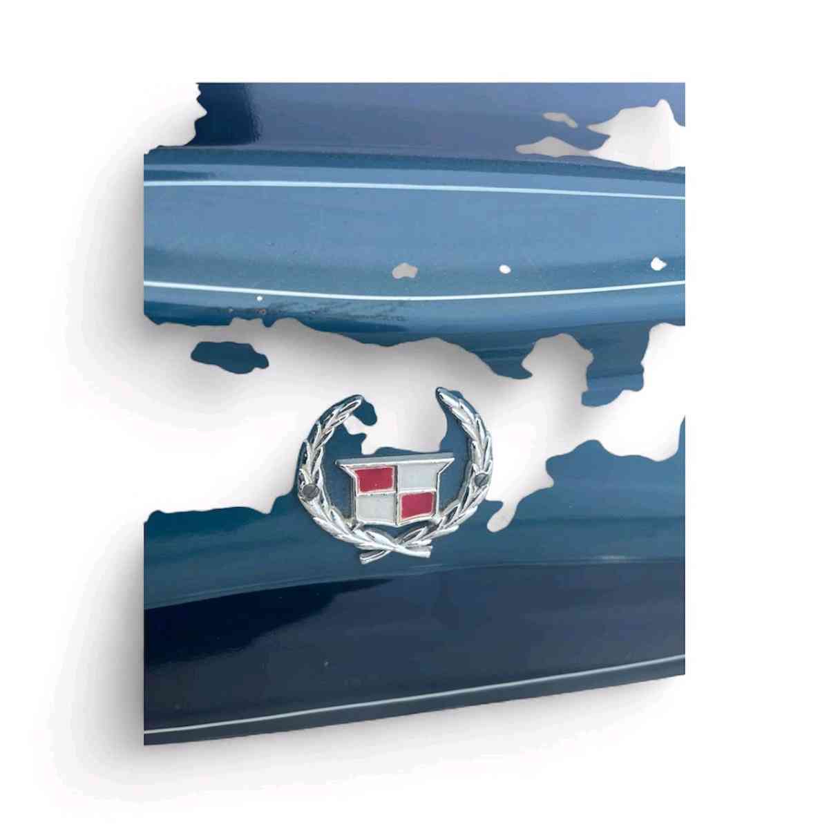 Antique cadillac scroller