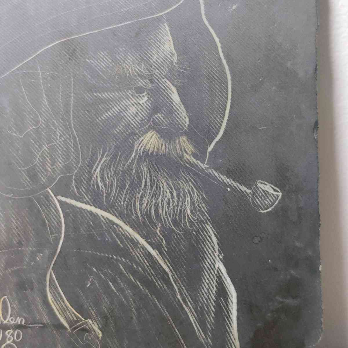 Slate drawing of a Wharf Fisherman