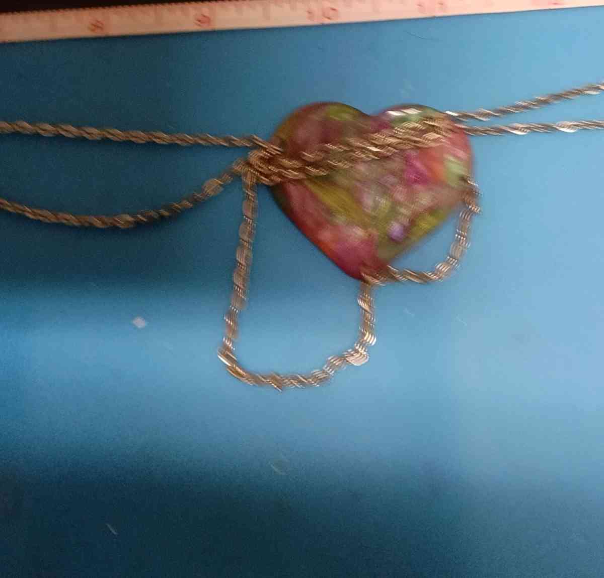 multicolored resin heart with multiple chains