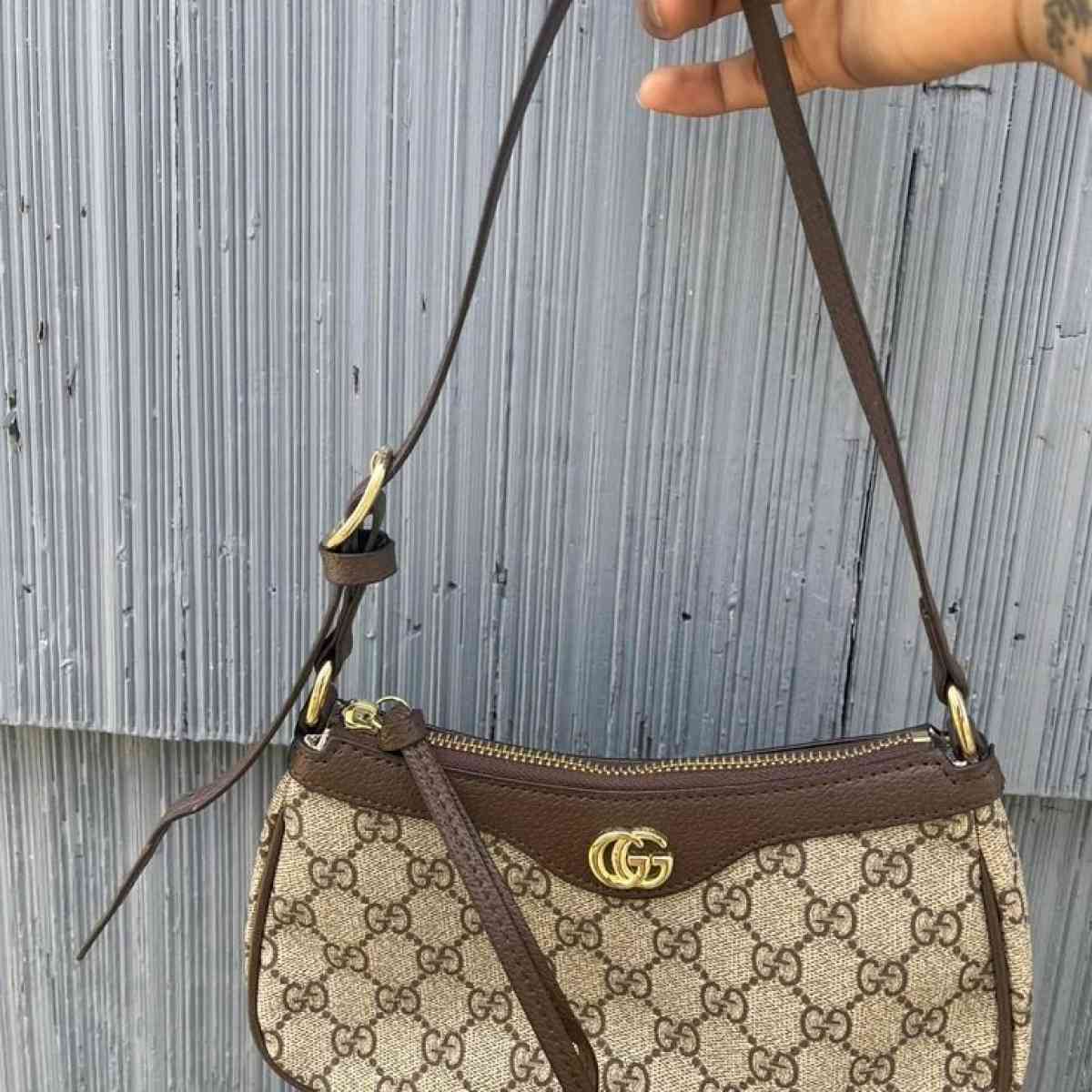 brown Gucci bag
