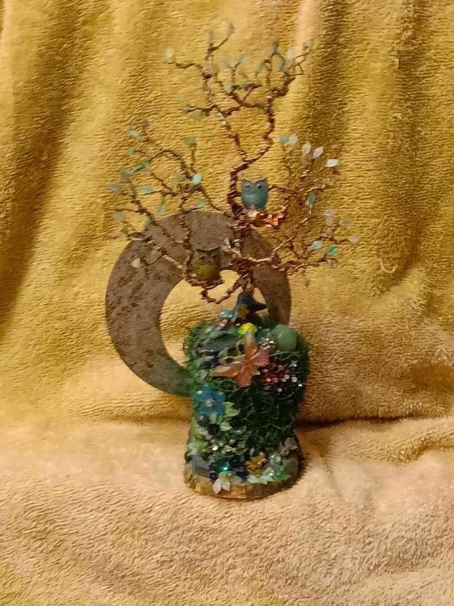 twisted copper tree with two owls