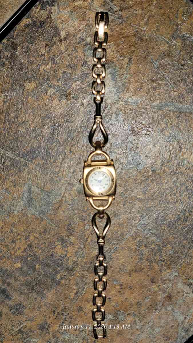 Vintage Fossil gold tone watch with case