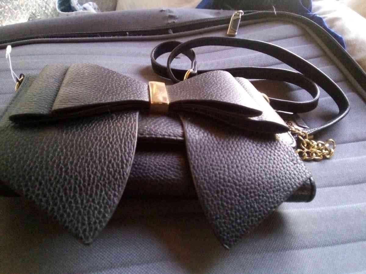 Black bow handbag