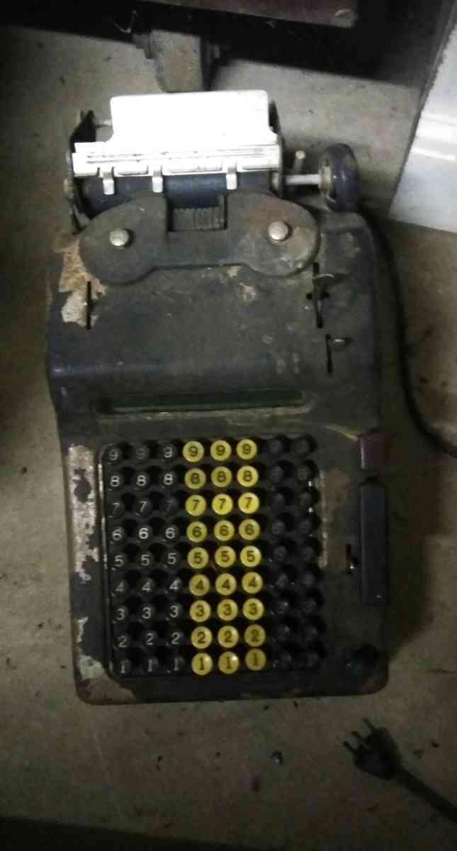 Antique adding machine