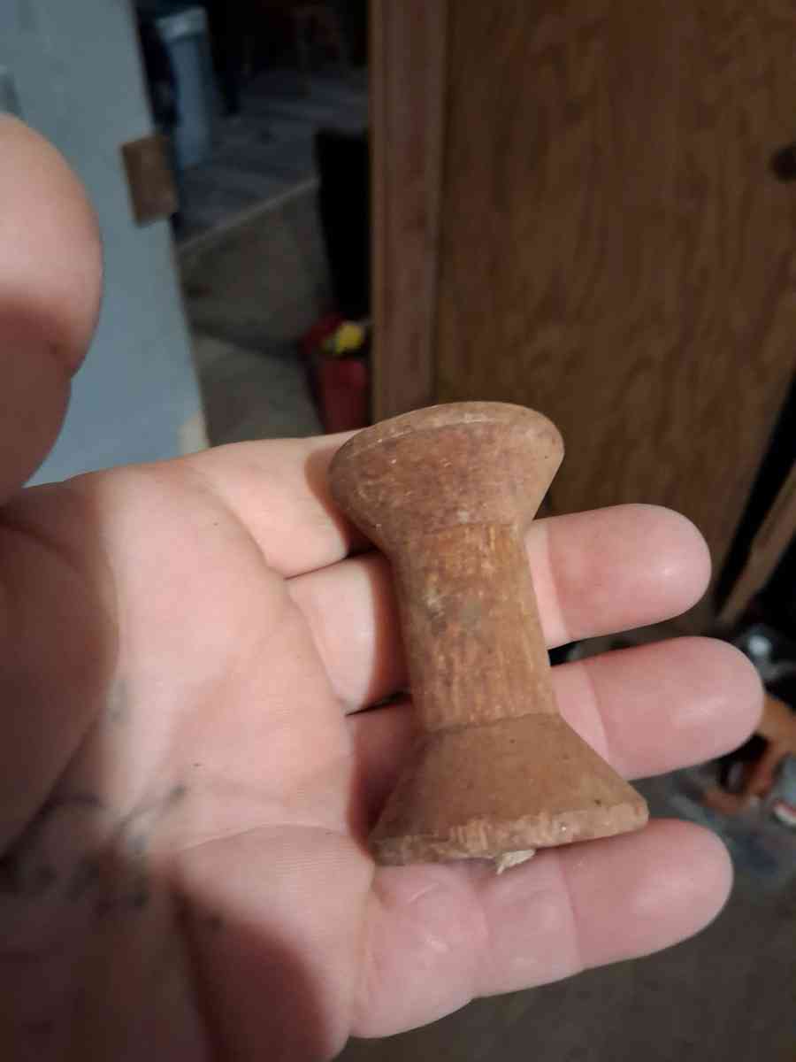 wooden thread spool 1930s has stamps on top